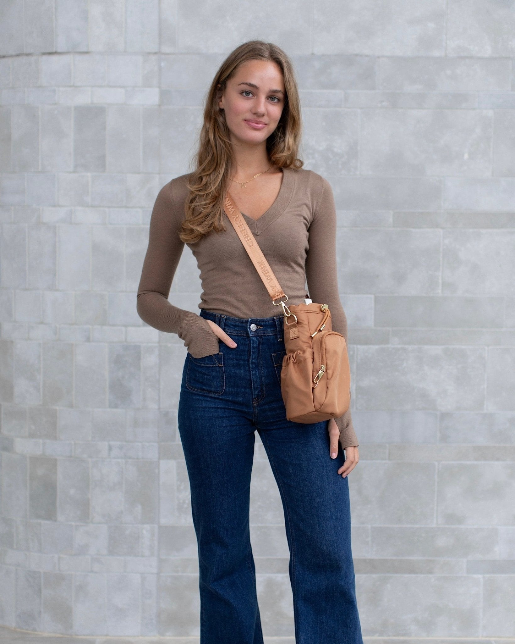 Mocha water bottle bag with anti-theft zips and hidden passport pocket by Cheeky Winx