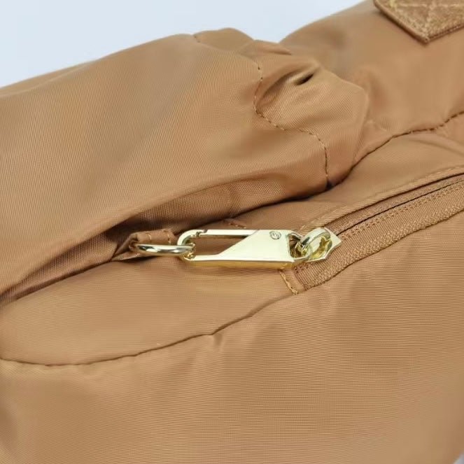 Mocha water bottle bag with anti-theft zips and hidden passport pocket by Cheeky Winx